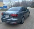 Серый Фольксваген Джетта, объемом двигателя 1.4 л и пробегом 88 тыс. км за 13300 $, фото 5 на Automoto.ua