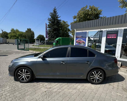 Сірий Фольксваген Джетта, об'ємом двигуна 1.39 л та пробігом 105 тис. км за 11000 $, фото 4 на Automoto.ua