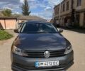 Сірий Фольксваген Джетта, об'ємом двигуна 1.4 л та пробігом 118 тис. км за 10000 $, фото 1 на Automoto.ua