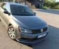 Серый Фольксваген Джетта, объемом двигателя 1.4 л и пробегом 104 тыс. км за 10500 $, фото 1 на Automoto.ua