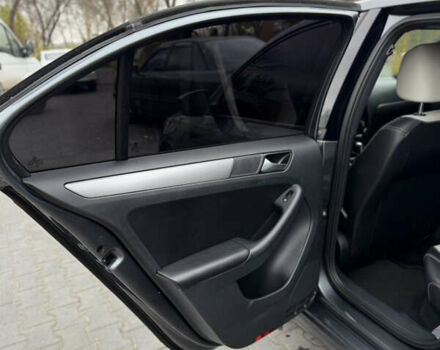 Серый Фольксваген Джетта, объемом двигателя 1.8 л и пробегом 237 тыс. км за 10300 $, фото 19 на Automoto.ua