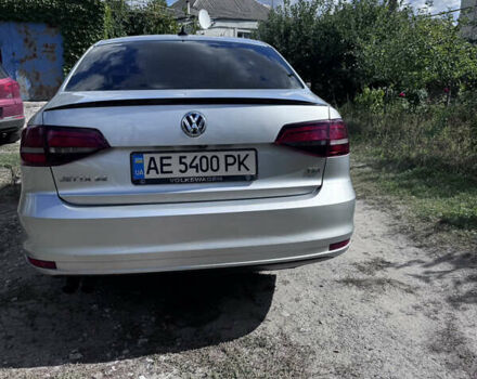 Сірий Фольксваген Джетта, об'ємом двигуна 1.39 л та пробігом 148 тис. км за 11000 $, фото 2 на Automoto.ua