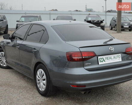 Серый Фольксваген Джетта, объемом двигателя 1.4 л и пробегом 110 тыс. км за 12800 $, фото 2 на Automoto.ua