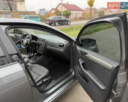 Сірий Фольксваген Джетта, об'ємом двигуна 1.39 л та пробігом 102 тис. км за 12200 $, фото 10 на Automoto.ua
