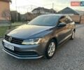 Серый Фольксваген Джетта, объемом двигателя 1.4 л и пробегом 70 тыс. км за 9750 $, фото 1 на Automoto.ua