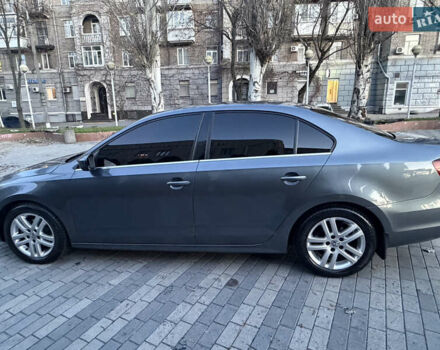 Серый Фольксваген Джетта, объемом двигателя 1.39 л и пробегом 168 тыс. км за 9700 $, фото 5 на Automoto.ua