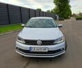 Серый Фольксваген Джетта, объемом двигателя 1.4 л и пробегом 135 тыс. км за 11600 $, фото 1 на Automoto.ua