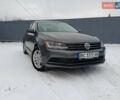 Серый Фольксваген Джетта, объемом двигателя 1.4 л и пробегом 57 тыс. км за 11500 $, фото 1 на Automoto.ua