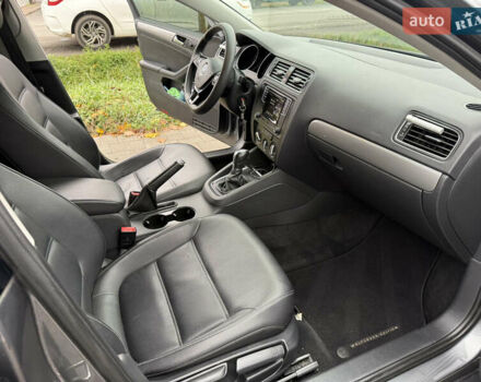 Сірий Фольксваген Джетта, об'ємом двигуна 1.39 л та пробігом 102 тис. км за 12200 $, фото 11 на Automoto.ua