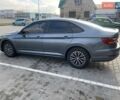 Серый Фольксваген Джетта, объемом двигателя 1.4 л и пробегом 96 тыс. км за 17600 $, фото 3 на Automoto.ua