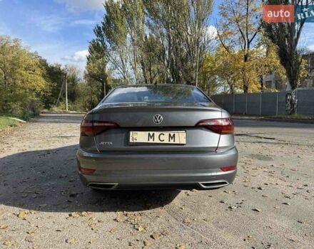 Серый Фольксваген Джетта, объемом двигателя 1.4 л и пробегом 81 тыс. км за 16855 $, фото 3 на Automoto.ua