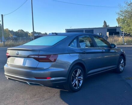 Серый Фольксваген Джетта, объемом двигателя 1.4 л и пробегом 32 тыс. км за 9500 $, фото 3 на Automoto.ua