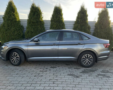 Серый Фольксваген Джетта, объемом двигателя 1.4 л и пробегом 89 тыс. км за 15700 $, фото 7 на Automoto.ua