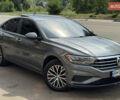 Серый Фольксваген Джетта, объемом двигателя 1.4 л и пробегом 99 тыс. км за 17777 $, фото 1 на Automoto.ua