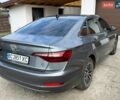 Сірий Фольксваген Джетта, об'ємом двигуна 1.4 л та пробігом 98 тис. км за 13900 $, фото 10 на Automoto.ua