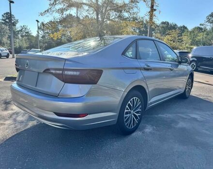 Серый Фольксваген Джетта, объемом двигателя 1.4 л и пробегом 13 тыс. км за 10850 $, фото 2 на Automoto.ua