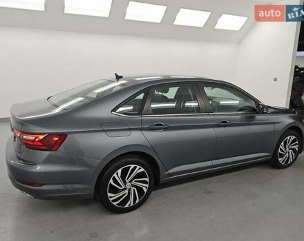 Серый Фольксваген Джетта, объемом двигателя 1.4 л и пробегом 112 тыс. км за 4400 $, фото 2 на Automoto.ua