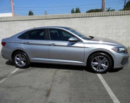 Серый Фольксваген Джетта, объемом двигателя 1.5 л и пробегом 23 тыс. км за 13400 $, фото 2 на Automoto.ua