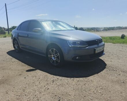 Серый Фольксваген Джетта, объемом двигателя 1.4 л и пробегом 84 тыс. км за 11500 $, фото 1 на Automoto.ua