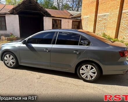 Серый Фольксваген Джетта, объемом двигателя 1.4 л и пробегом 118 тыс. км за 10500 $, фото 1 на Automoto.ua