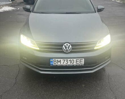 Серый Фольксваген Джетта, объемом двигателя 1.4 л и пробегом 56 тыс. км за 14200 $, фото 1 на Automoto.ua