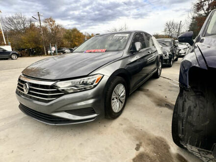 Серый Фольксваген Джетта, объемом двигателя 1.4 л и пробегом 81 тыс. км за 10800 $, фото 1 на Automoto.ua