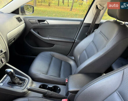 Синій Фольксваген Джетта, об'ємом двигуна 1.4 л та пробігом 100 тис. км за 9500 $, фото 16 на Automoto.ua