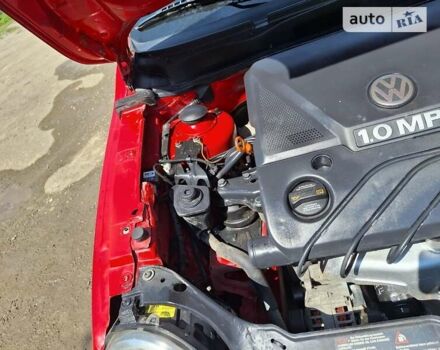 Красный Фольксваген Лупо, объемом двигателя 1 л и пробегом 147 тыс. км за 2200 $, фото 51 на Automoto.ua