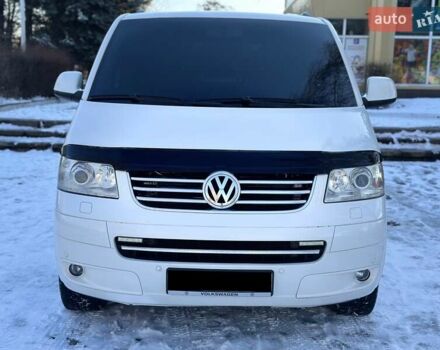 Белый Фольксваген Мультиван, объемом двигателя 2.5 л и пробегом 200 тыс. км за 13999 $, фото 1 на Automoto.ua