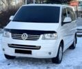 Белый Фольксваген Мультиван, объемом двигателя 2.5 л и пробегом 200 тыс. км за 13999 $, фото 1 на Automoto.ua