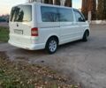 Фольксваген Мультиван 2008 в Нежине на Automoto.ua Белый Фольксваген Мультиван, объемом двигателя 2.5 л и пробегом 330 тыс. км за 10000 $, фото 2 на Automoto.ua