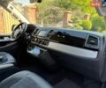 Білий Фольксваген Мультиван, об'ємом двигуна 2 л та пробігом 227 тис. км за 39372 $, фото 77 на Automoto.ua