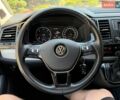 Білий Фольксваген Мультиван, об'ємом двигуна 2 л та пробігом 227 тис. км за 39372 $, фото 24 на Automoto.ua