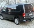 Черный Фольксваген Мультиван, объемом двигателя 2 л и пробегом 270 тыс. км за 6782 $, фото 1 на Automoto.ua