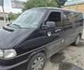 Черный Фольксваген Мультиван, объемом двигателя 2.5 л и пробегом 427 тыс. км за 6000 $, фото 1 на Automoto.ua
