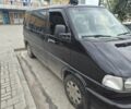 Чорний Фольксваген Мультиван, об'ємом двигуна 2.5 л та пробігом 427 тис. км за 6000 $, фото 1 на Automoto.ua