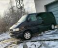 Черный Фольксваген Мультиван, объемом двигателя 2.5 л и пробегом 305 тыс. км за 3500 $, фото 1 на Automoto.ua