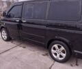 Черный Фольксваген Мультиван, объемом двигателя 2.5 л и пробегом 297 тыс. км за 15550 $, фото 2 на Automoto.ua