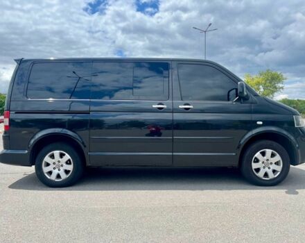 Чорний Фольксваген Мультиван, об'ємом двигуна 2.5 л та пробігом 310 тис. км за 13000 $, фото 1 на Automoto.ua