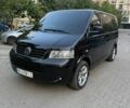 Чорний Фольксваген Мультиван, об'ємом двигуна 2.5 л та пробігом 270 тис. км за 12000 $, фото 1 на Automoto.ua