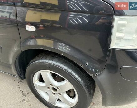 Черный Фольксваген Мультиван, объемом двигателя 3.2 л и пробегом 305 тыс. км за 8700 $, фото 3 на Automoto.ua