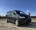 Чорний Фольксваген Мультиван, об'ємом двигуна 2.5 л та пробігом 300 тис. км за 6500 $, фото 1 на Automoto.ua