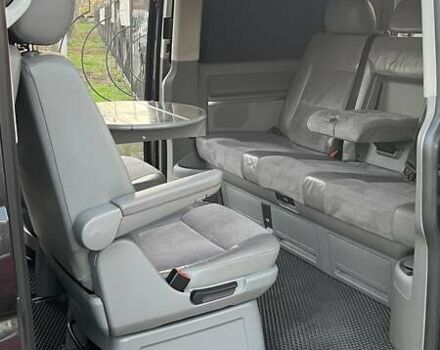 Черный Фольксваген Мультиван, объемом двигателя 2.5 л и пробегом 377 тыс. км за 11990 $, фото 7 на Automoto.ua