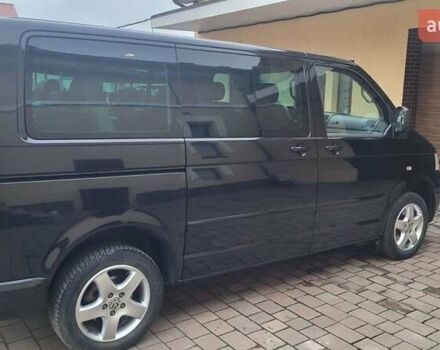 Черный Фольксваген Мультиван, объемом двигателя 3.2 л и пробегом 325 тыс. км за 12000 $, фото 1 на Automoto.ua