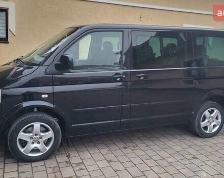 Черный Фольксваген Мультиван, объемом двигателя 3.2 л и пробегом 325 тыс. км за 12000 $, фото 2 на Automoto.ua