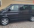Черный Фольксваген Мультиван, объемом двигателя 3.2 л и пробегом 325 тыс. км за 12000 $, фото 2 на Automoto.ua
