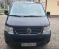 Черный Фольксваген Мультиван, объемом двигателя 3.2 л и пробегом 325 тыс. км за 12000 $, фото 1 на Automoto.ua