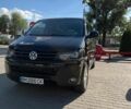 Чорний Фольксваген Мультиван, об'ємом двигуна 2 л та пробігом 432 тис. км за 18065 $, фото 1 на Automoto.ua