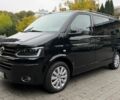 Чорний Фольксваген Мультиван, об'ємом двигуна 2 л та пробігом 240 тис. км за 23500 $, фото 1 на Automoto.ua