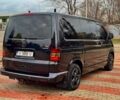 Черный Фольксваген Мультиван, объемом двигателя 2.5 л и пробегом 286 тыс. км за 18500 $, фото 5 на Automoto.ua